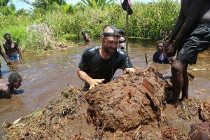 Ed Stafford and villagers of Yeobi building a mud island (Bedeng).